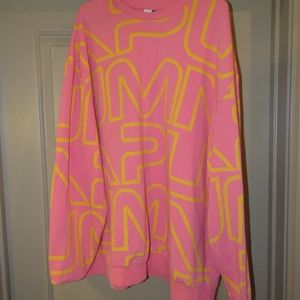 pink yellow puma sweatshirt. worn before great condition 3xl